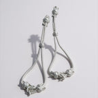 Sujeta mangas caftán plata